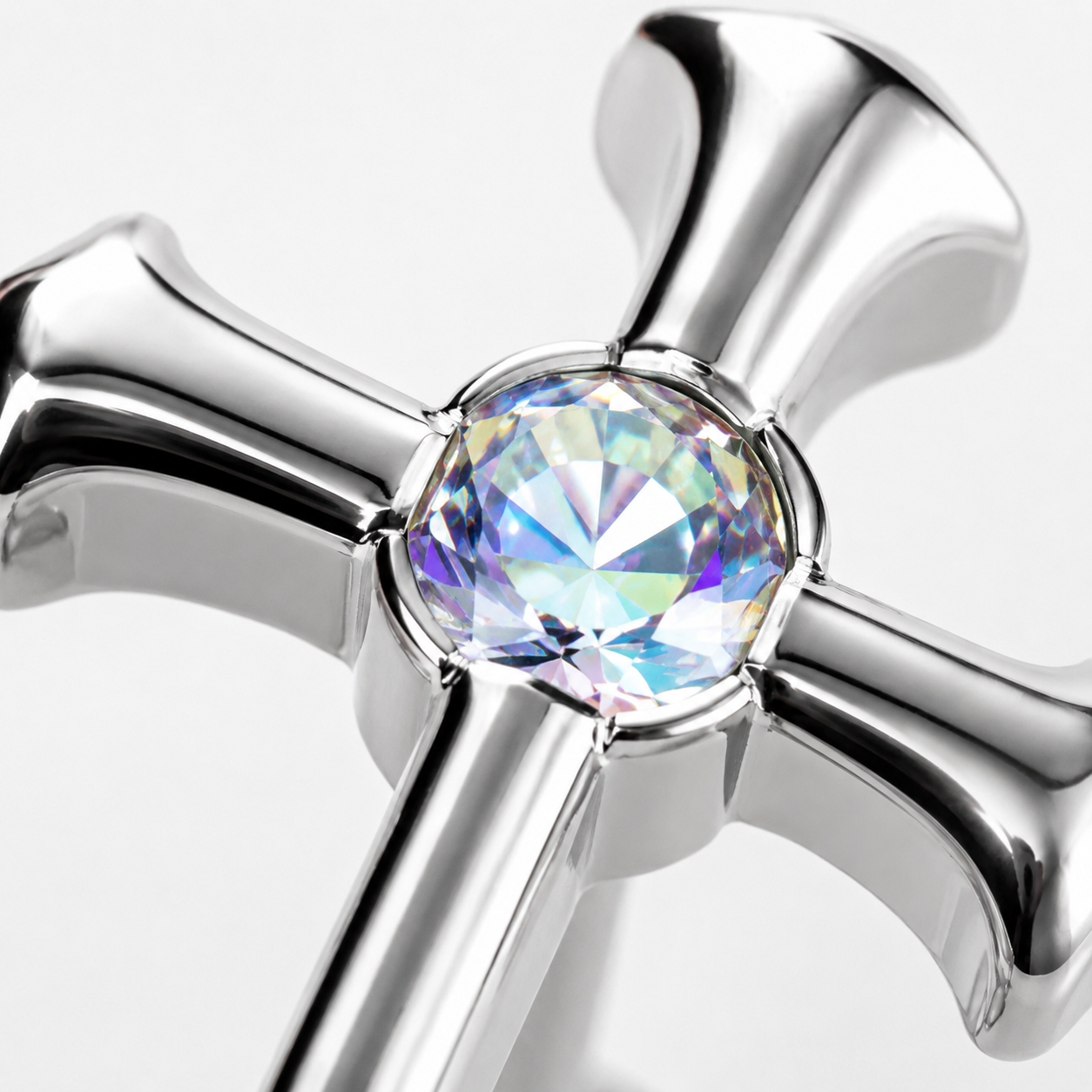 Close-up zircon detail on titanium cross piercing jewelry
