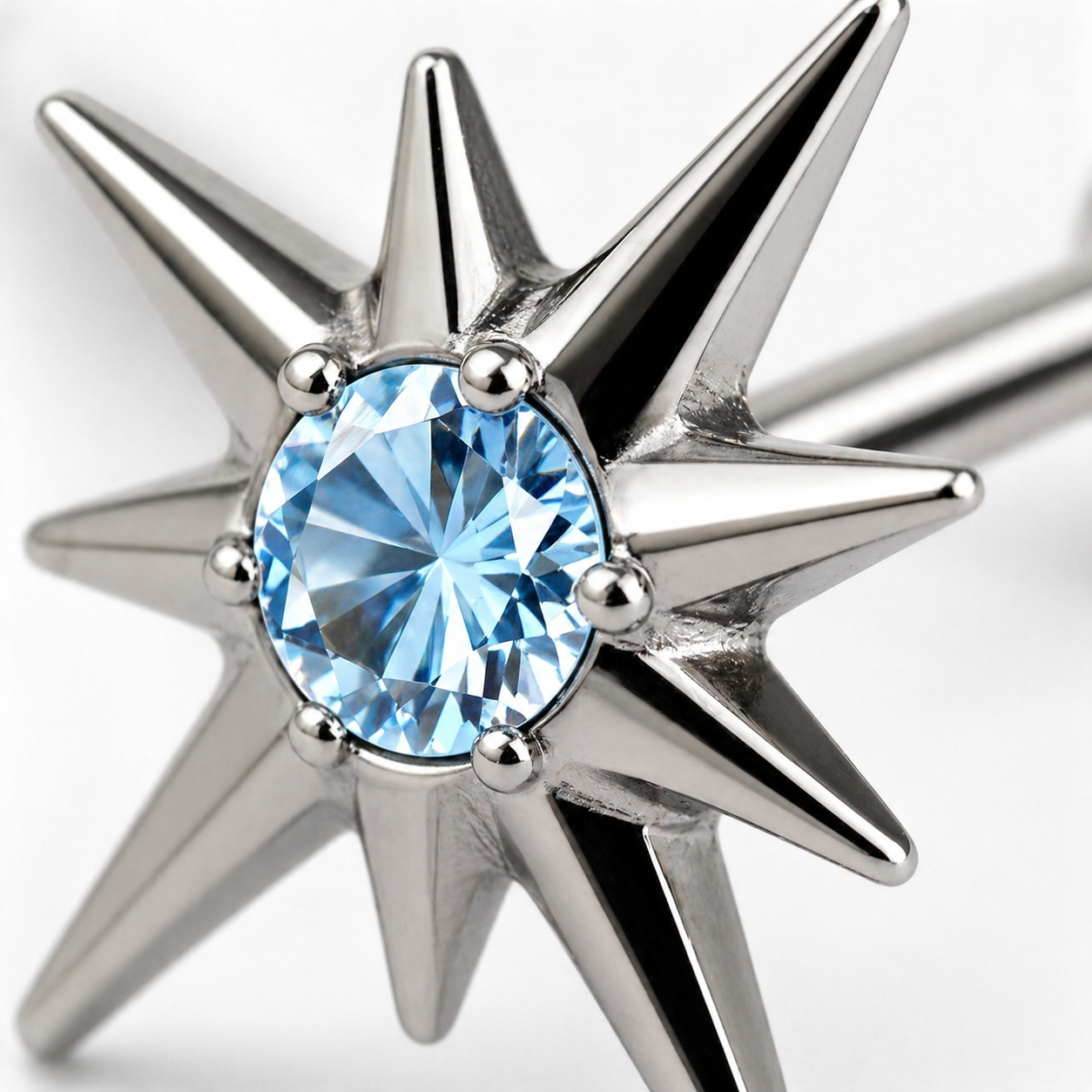 Close-up of CZ gemstone and polished titanium setting