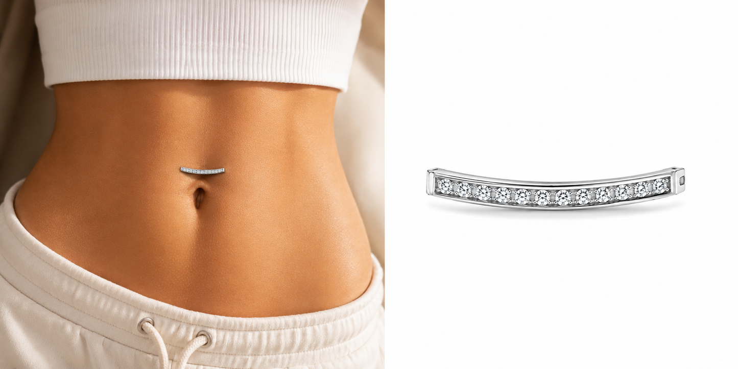 Luxury minimalist titanium belly ring with pavé zircon stones and polished silver finish.