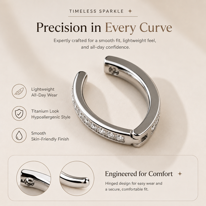 Curved titanium clicker belly ring with sleek polished finish and secure hinged closure.