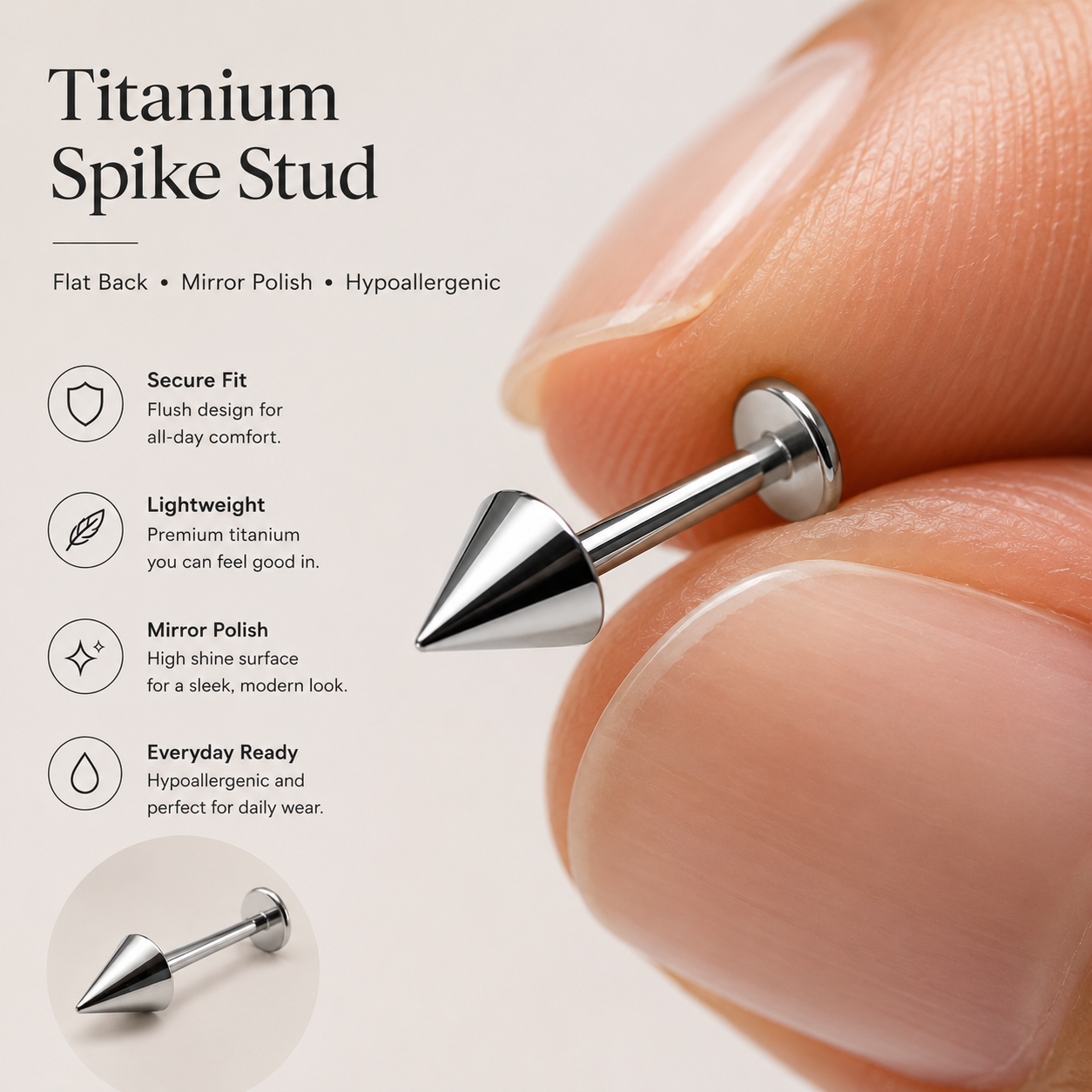 Close-up macro detail of polished titanium spike piercing jewelry with smooth mirror finish