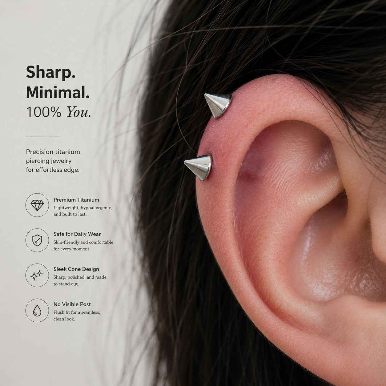 Woman wearing titanium spike flat back stud in helix piercing with clean minimalist ear styling